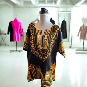 Black and Orange Patterned Women's Top with two pockets in front NWOT